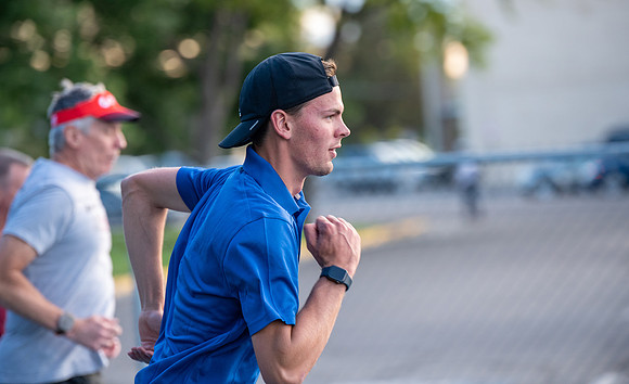 Faculty and community members of BYUI at Speed and Agility triathlete trannings at the stadium.