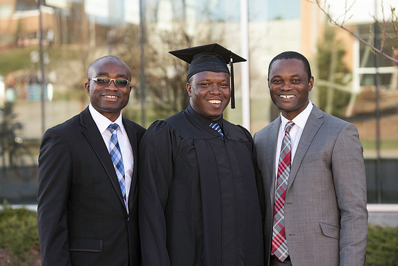 Students gather in their cap and gowns for graduation from BYU-Idaho April 6, 2016.
