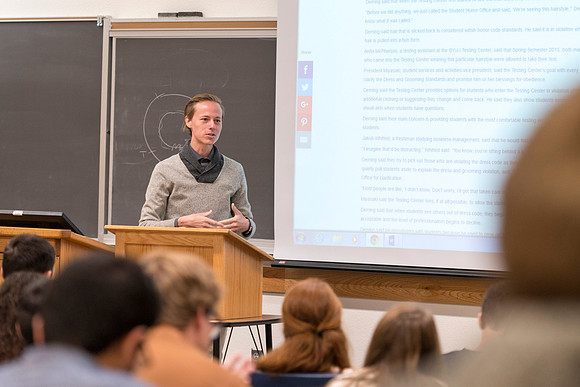 Teacher Assistant, Bobby Holder, discusses with his class about deviating from the norm and the effect it can have on society.