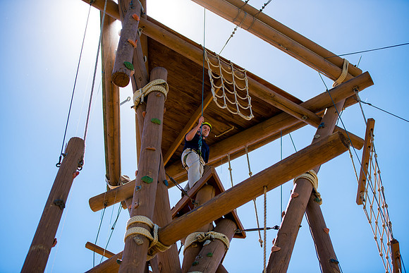 Online Instructors come to BYU-Idaho campus for further learning to enhance teaching skills. Instructors take their turn at the Ropes Course.