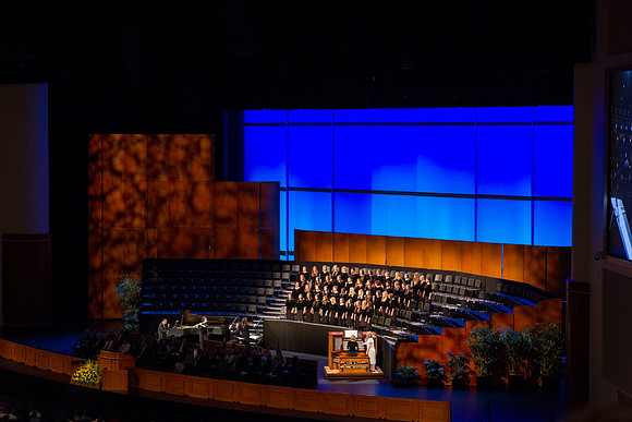 The Women's Glee Choir sings during devotional with Bishop Gérald Caussé as the guest speaker. Photo by Tyler Rickenbach.