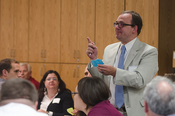Richard Clifford shares an idea with other faculty members at the BYU-Idaho Faculty Conference