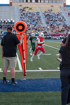 BYU-Idaho Football Teams compete in the Final Game of the Season. Students cheer them on from the stands, as the spirit team and Rix Stix Rally them up.