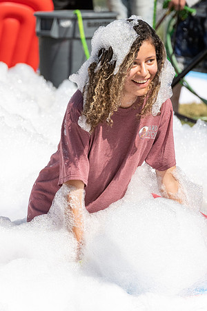 Students gather by the upper fields on the BYU-Idaho Campus to play recreation games, slip 'n' slide, mud volleyball, and try the ropes course.