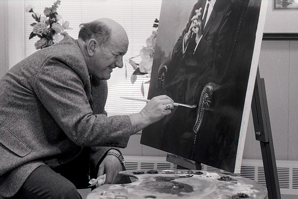Dick Bird restoring painting of President Joseph Fielding Smith.