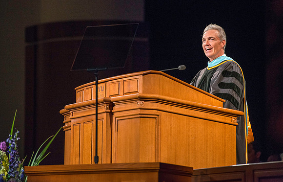 Devin G. Durrant, First Counselor in the Sunday School General Presidency speaks to the graduates.