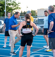 Faculty and community members of BYUI at Speed and Agility triathlete trannings at the stadium.