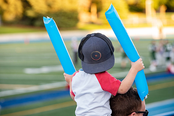BYU-Idaho Football Teams compete in the Final Game of the Season. Students cheer them on from the stands, as the spirit team and Rix Stix Rally them up.