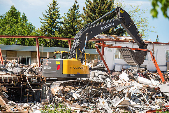 History coming down to make room for more parking.