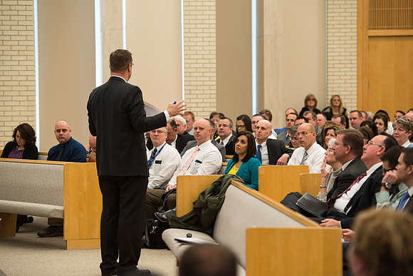 President Gilbert meets with employees in the Taylor Chapel.