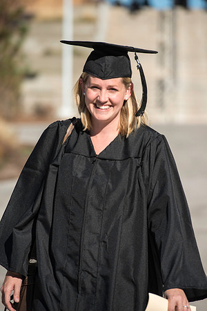 Students gather in their cap and gowns for graduation from BYU-Idaho April 6, 2016.