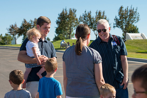 Faculty and their families, as part of the Online Learning & Teaching Conference, join together for dinner and games.