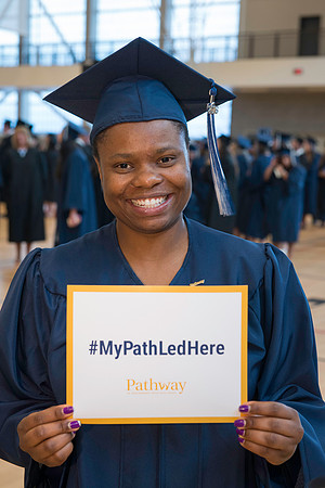 Pathway graduates gather before commencement.