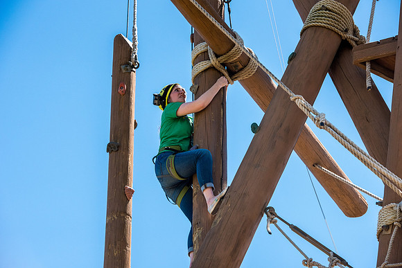 Online Instructors come to BYU-Idaho campus for further learning to enhance teaching skills. Instructor, Rebecca Dance, takes her turn at the Ropes Course.