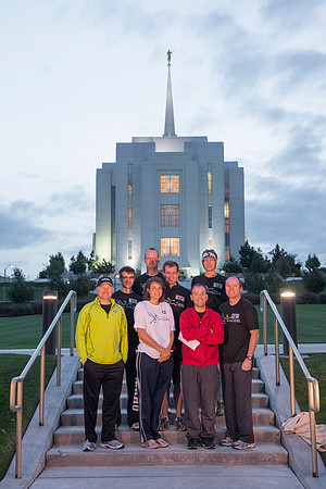 Team members pose by the Rexburg temple before they begin the temple to temple run