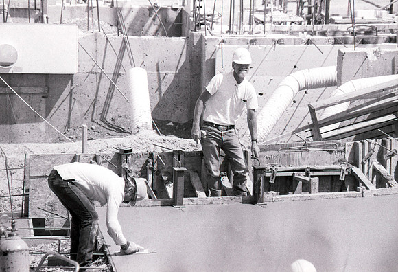 Construction takes place on the Religion Building site.