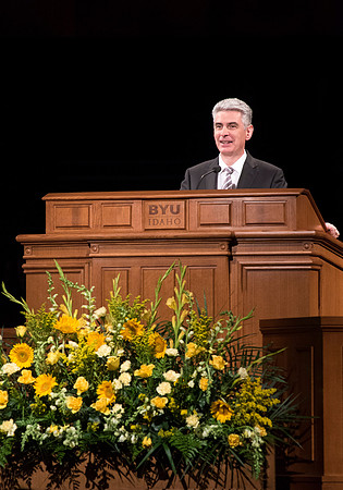 Presiding Bishop, Gérald Caussé, speaks to BYU-Idaho students at devotional. Photo by Ryan Chase