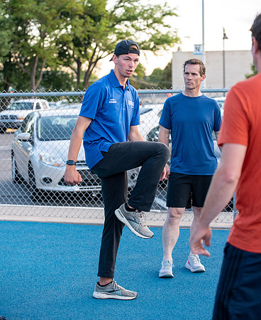 Faculty and community members of BYUI at Speed and Agility triathlete trannings at the stadium.