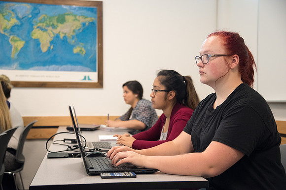 Scott Martin, Visiting Faculty in the Psychology department, teaches students in the psychology department.