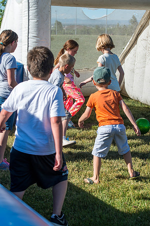 Faculty and their families, as part of the Online Learning & Teaching Conference, join together for dinner and games.