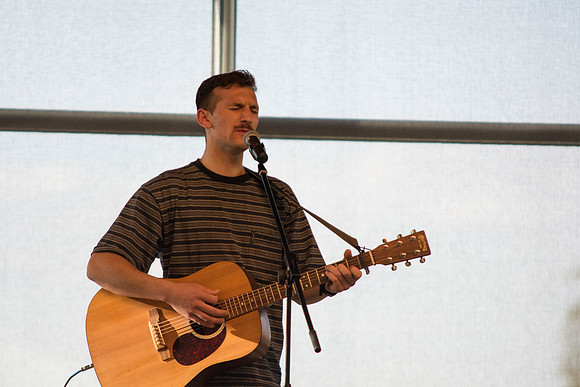 Aaron McCall performs during The Last Voice Standing in the Crossroads, Wednesday night during the 2014 Spring Semester.