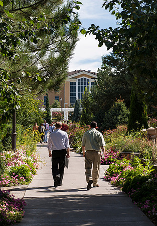 Faculty gather in the Hinckley Building at a Faculty Conference to share and learn from each other at the beginning of the 2013 Fall semester.