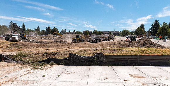 Work moves forward clearing debri from Dorm demolition to make ready for parking.