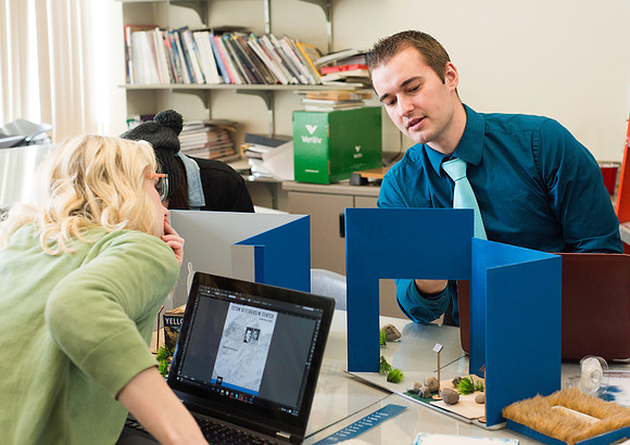Graphic Design Class taught by Shawn Randall. Students work in teams designing museum space for the Geotourism Museum in Driggs, Idaho. The winning group will help implement their design.