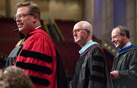College of Agriculture and Life Sciences Convocation in the Byu-Idaho Center. Elder Wilson and President Clark along with College Dean, John Zenger congratulate the graduates.
