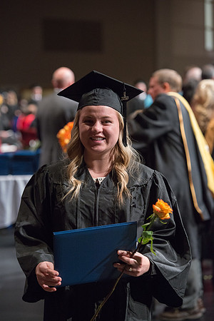 College of Agriculture and Life Sciences Convocation in the Byu-Idaho Center. Elder Wilson and President Clark along with College Dean, John Zenger congratulate the graduates.