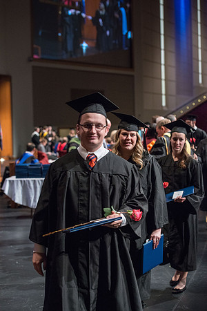 College of Agriculture and Life Sciences Convocation in the Byu-Idaho Center. Elder Wilson and President Clark along with College Dean, John Zenger congratulate the graduates.