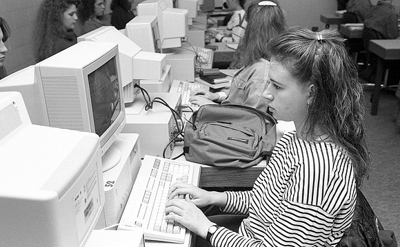 Students participating in an English computer class