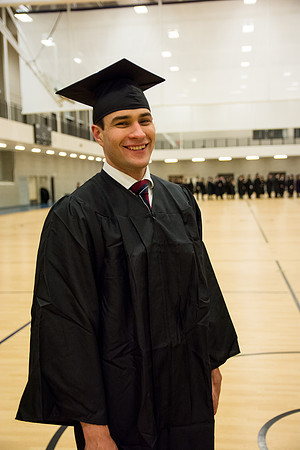 Rickard Busselberg smiles as he waits to graduate as a part of the Class of 2016. Busselberg is the first in his family to become a college graduate.