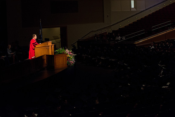 President Clark G. Gilbert stands and welcomes all graduates, family, and friends at Commencement.