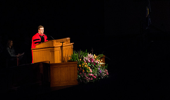President Clark G. Gilbert stands and welcomes all graduates, family, and friends at Commencement.