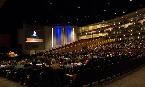 The audience listens as Elder Larry Y. Wilson addresses the congregation.