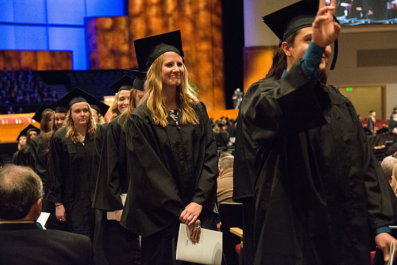 Graduate, Kazia Capener, of Class of 2016 smiles during Recessional.