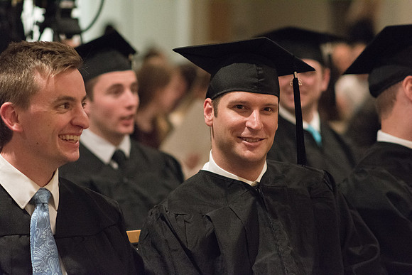 Graduates wait for Convocation to begin in the Taylor Chapel for the College of Physical Sciences.