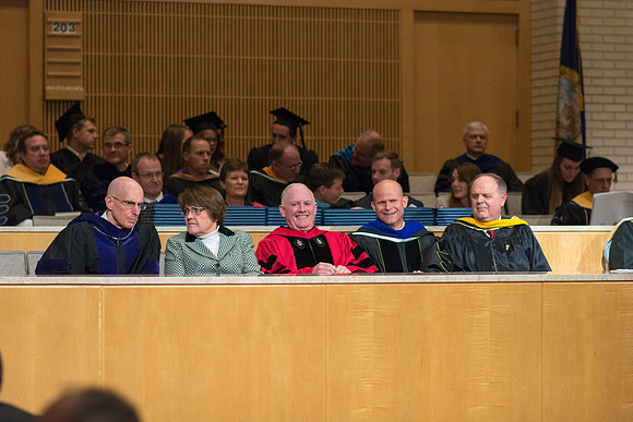 President Henry J. Eyring, Sister Sue Clark and Elder Kim B. Clark wait for Convocation to begin in the Taylor Chapel for the College of Physical Sciences.