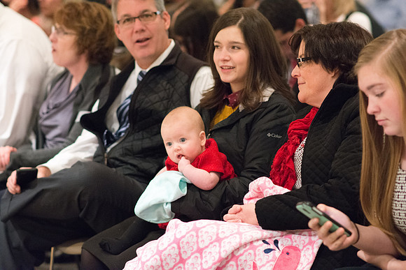Family members wait for Convocation to begin in the Taylor Chapel for the College of Physical Sciences.