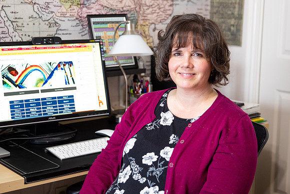 Photo of Professor Jessica Mecham from the Art department teaching remote Zoom class during Covid-19.