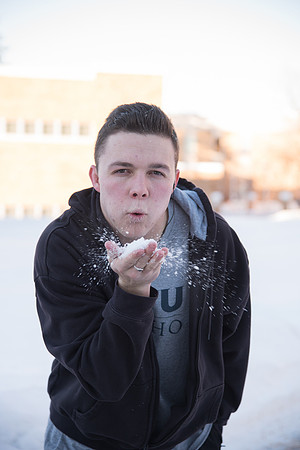 Student, Jaren Strader, doesn't mind playing in the snow.