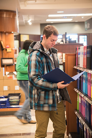 Student, Jason Ward, at the University Bookstore to pick up school supplies.