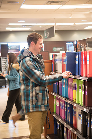Student, Jason Ward, at the University Bookstore to pick up school supplies.