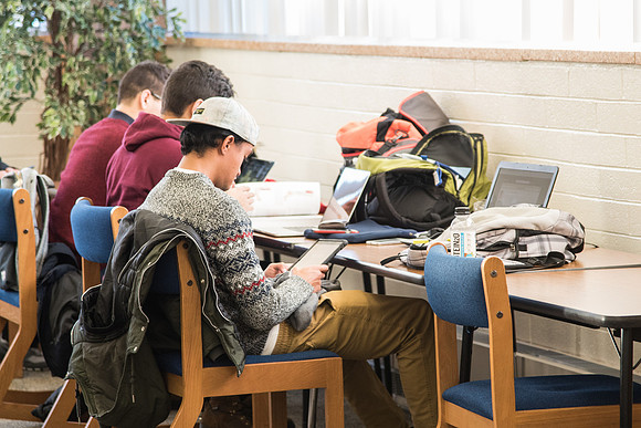 Students get back to studying in the Library.
