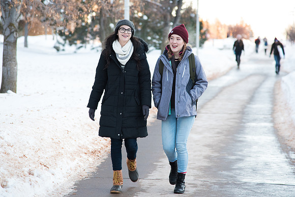 Students are cold with temperatures in the negatives, but it doesn't stop them from smiling.
