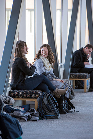 Students return to campus in the frigid cold temperatures.
