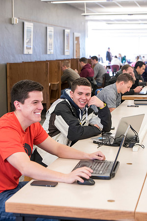 Students return to campus in the frigid cold temperatures.