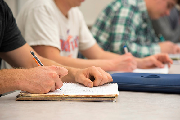 Students in a Civil Engineering class, Reinforced Concrete Design, are taught by Nathan Harris.