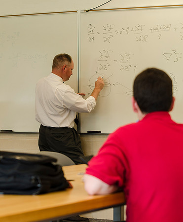 Brian Pyper teaches principles of Wave Physics to his class